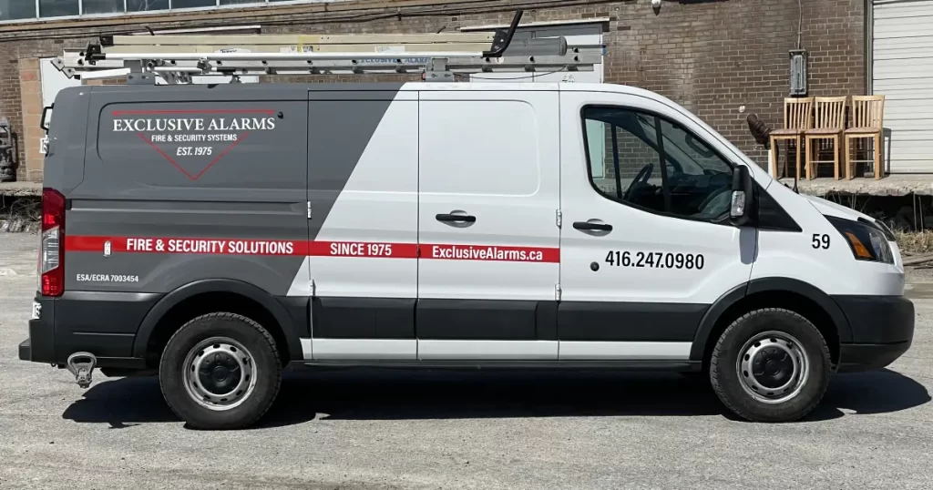 Ford Transit Partial Van Wrap for Exclusive Alarms - After - Side View