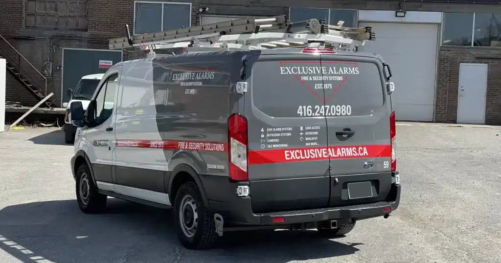 Ford Transit Van Partial Wrap for Exclusive Alarms - After - Back Angle View