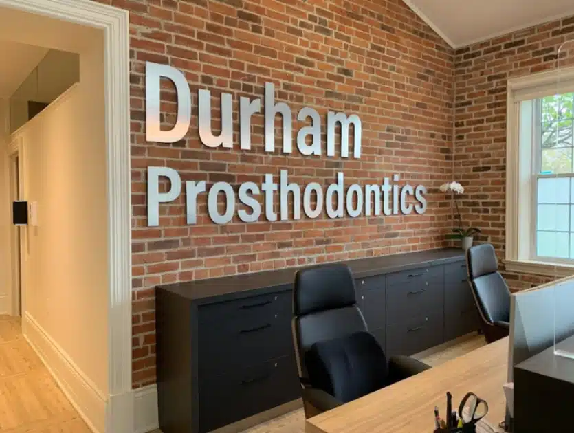 3d wall sign with front desk